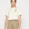 Lacoste TF HHW - T-shirt Z Nadrukiem - Flour/cob