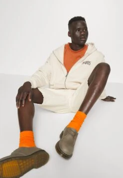 ISLAND OF HEARTBREAKS ZIP HOODIE UNISEX - Bluza Rozpinana - Cream -sklep Next f3861fe9879b4a9ead3816eb504de4e2